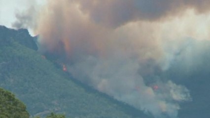 Bushfires in southeast Australia, as temperatures sizzle