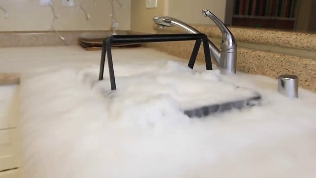 What Happens When You Drop Two Pounds Of Dry Ice In A Sink Filled With Hot Water