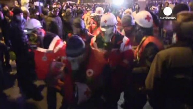 Dozens injured in Kyiv after clashes with riot police