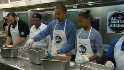 Obama serves up burritos in soup kitchen as part of MLK Day service event