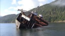 Boat intentionally capsizes to unload its cargo