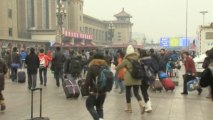 Millions in China travel home for holidays