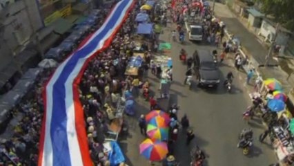 Thai protesters march, after election ruling