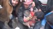 Buried baby is pulled from underneath rubble in Aleppo