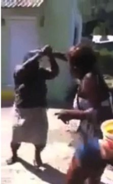 Jamaican Granny Beats Young Girl With Stick!