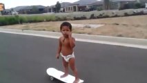 Two-year-old skateboarder shows his skills