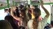Russian flashmob sings a Russian national folk song in a bus