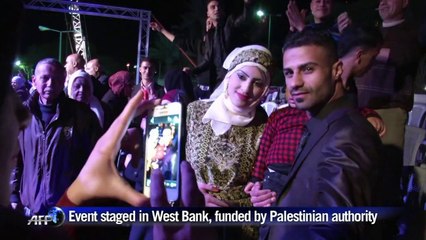 Nearly 600 Palestinians tie the knot in mass ceremony