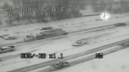 Heavy snow in rush hour causes chaos as dozens crash