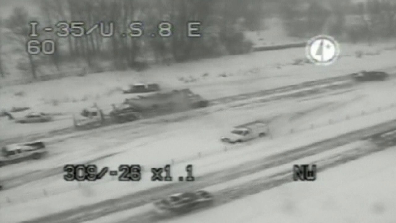 Heavy snow in rush hour causes chaos as dozens crash