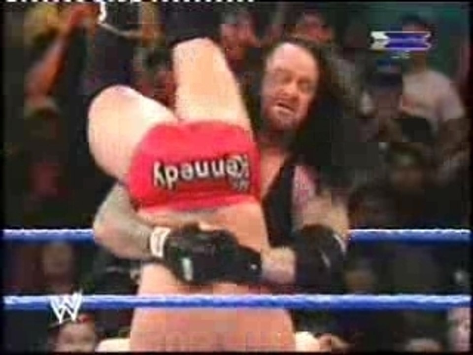 Undertaker destroy refaree & kennedy