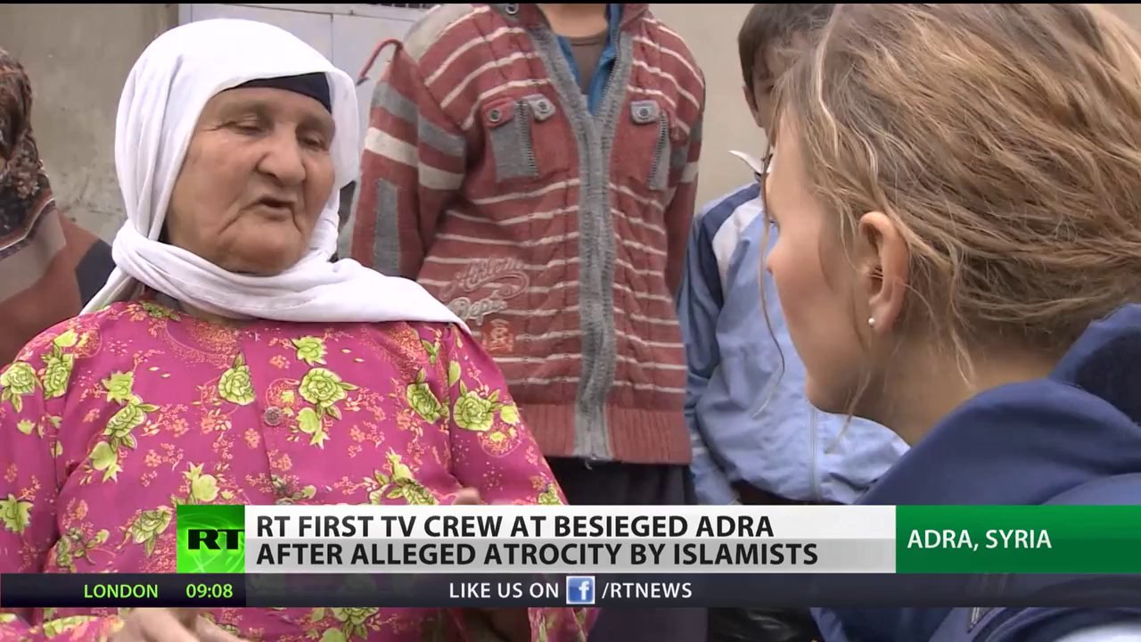 RT first TV crew at besieged Syria town after alleged atrocity by Islamists