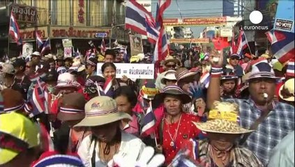 Gunfire and explosions rock Thai capital on eve of election