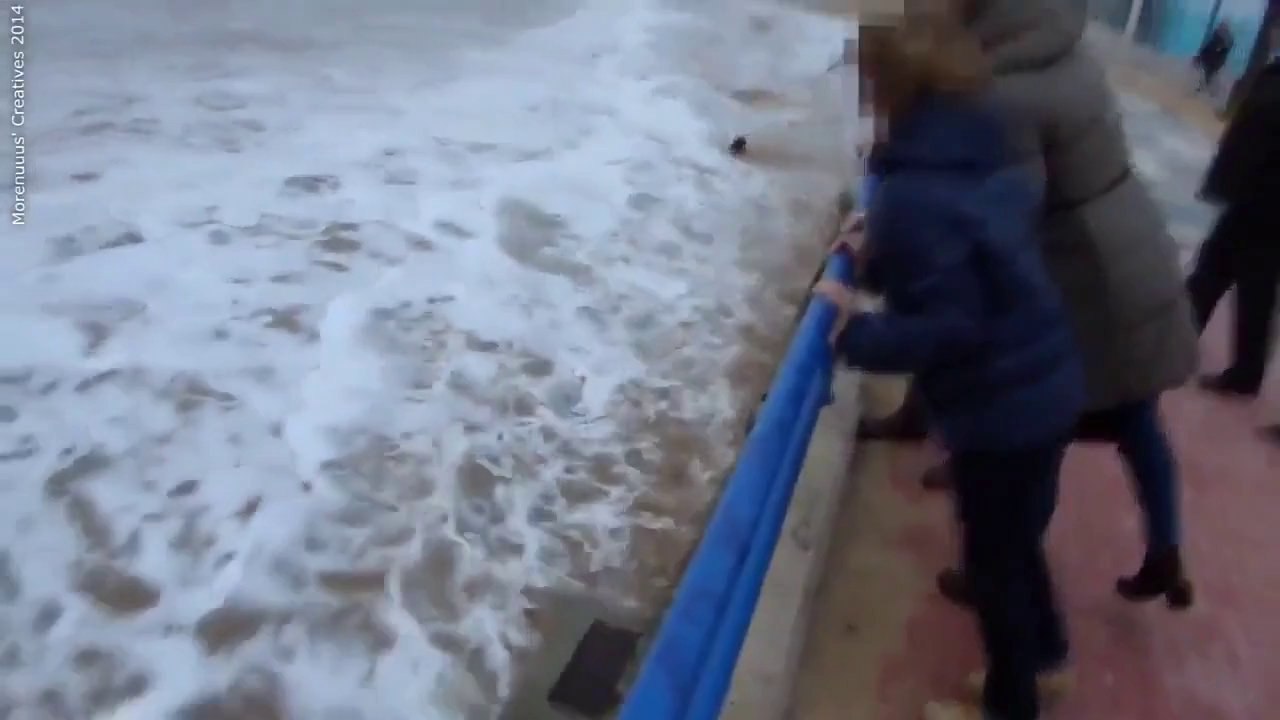 Fat lady trolled by wave