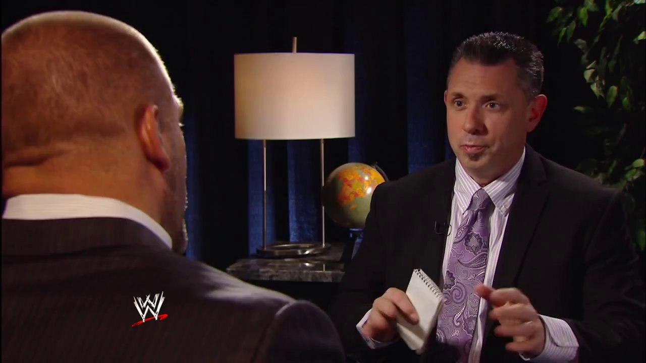Triple H weighs in on the hunt for the WWE World Heavyweight Title and announces a Steel Cage Match