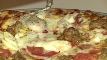 Une pizza au python au menu d'un restaurant en Floride