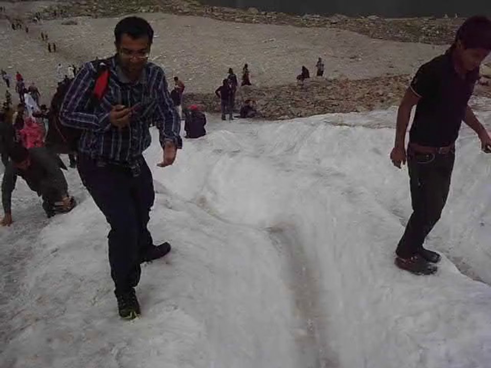 Snow Slipping fun at Lake Saif-ul-Malook, Naran Pakistan