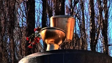 Protesters in Ukraine hope to flush away symbolic statue