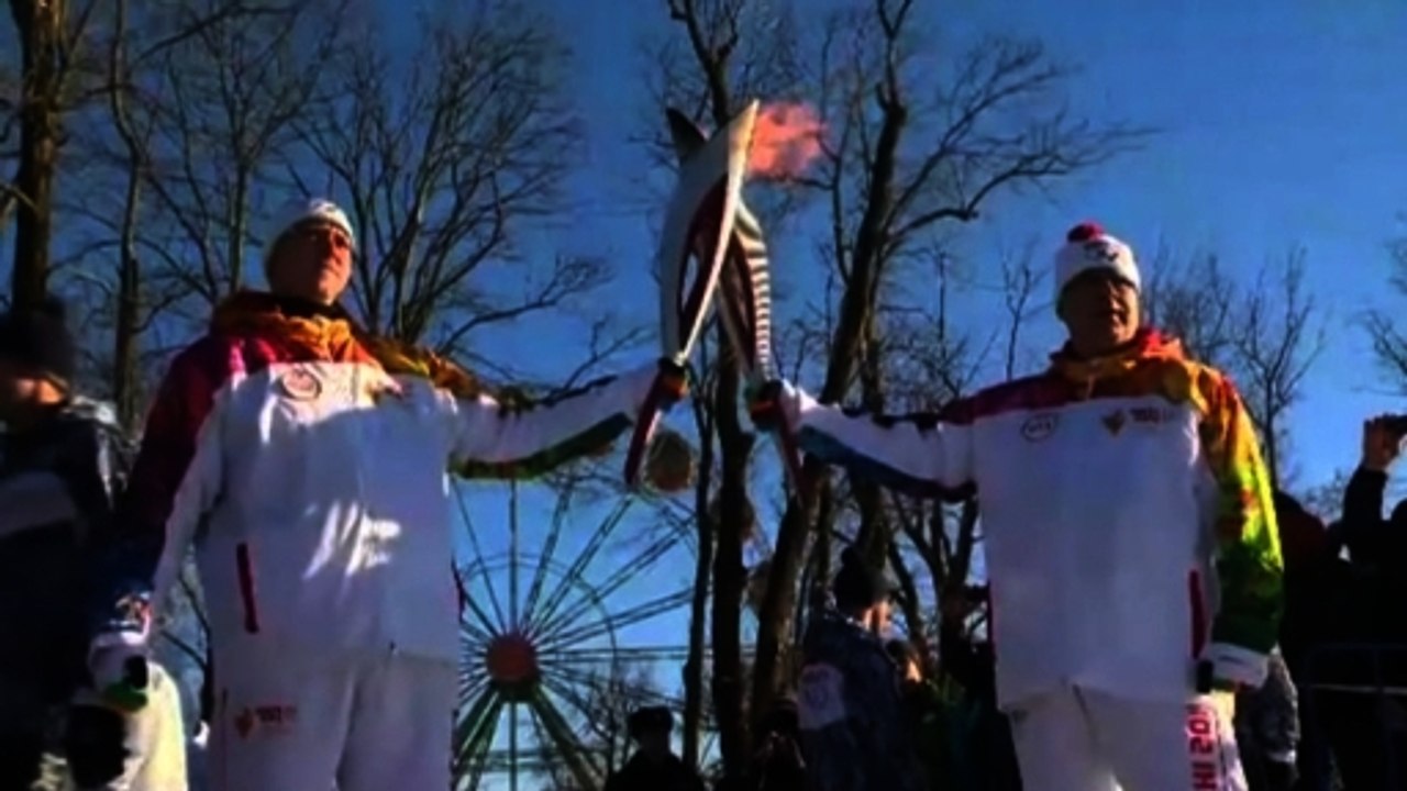 Olympic torch travels through volatile Caucasus region