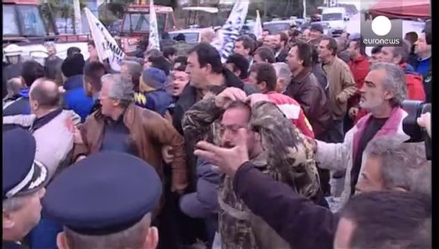 Greek farmers block roads over prices and taxes
