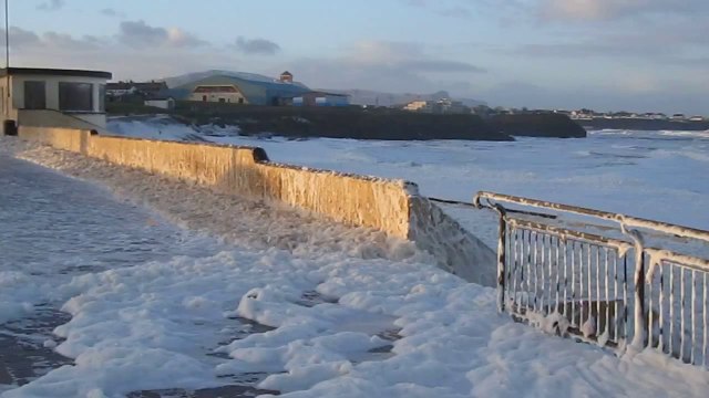 Storm Whips Up Masses of Sea Foam in Irish Town