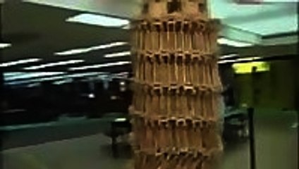 Clumsy Reporter Knocks Down Jenga Tower