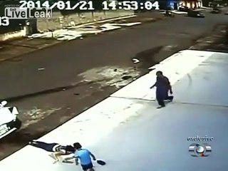 Kid escapes unharmed after being run over by a car