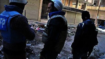 Mortars and gunfire in Homs delay aid mission