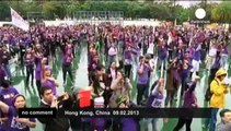 Hundreds of foreign domestic helpers in Hong Kong dance for justice