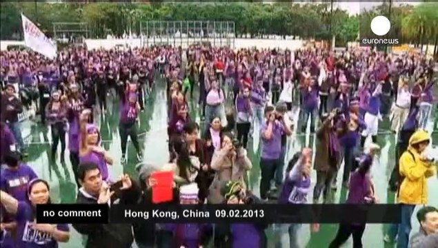 Hundreds of foreign domestic helpers in Hong Kong dance for justice