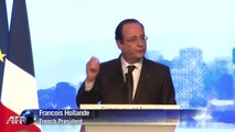 Hollande tries to woo expat French and US business