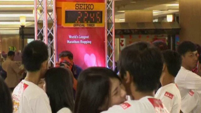 Couples in Thailand go for hugging world record