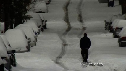 ,Americans ski, sled and dig themselves out after heavy snowfall