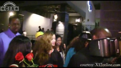 Rihanna Looking Gorgeous In A Large Fluffy White Jacket And Denim Shorts