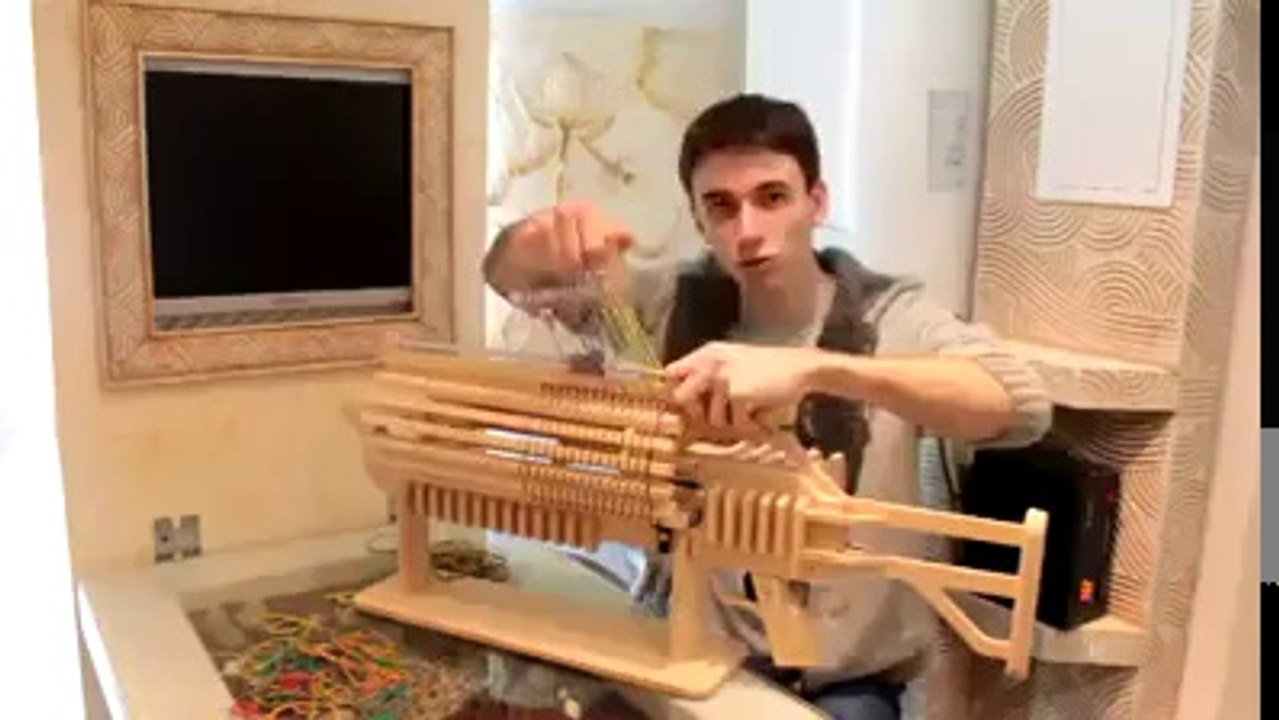Rubber Band Machine Gun with unique Fast Charger