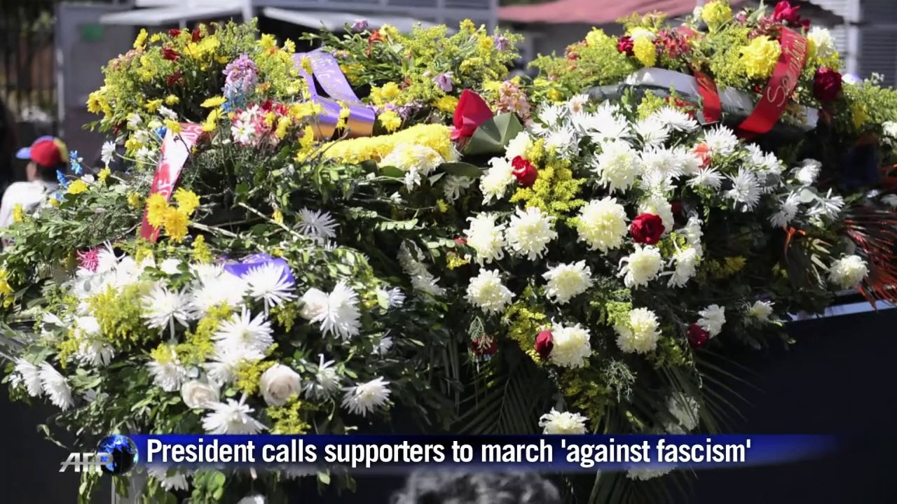 Venezuela pro-government supporters rally at funeral