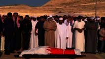 Mourners bury policeman in Bahrain as peaceful protest marks third anniversary of failed uprising