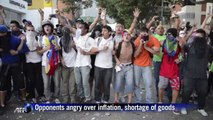 Venezuelan students clash with police in anti-Maduro protest