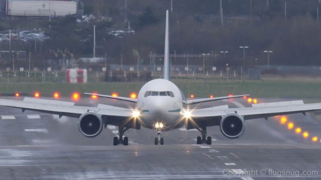 Boeing 767 Landing Gear Takes A Beating During Landing In Strong Winds
