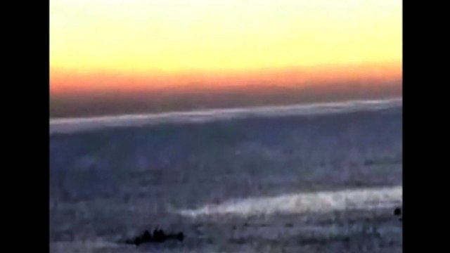 Spanish police fire rubber bullets as migrants try to swim to Spain