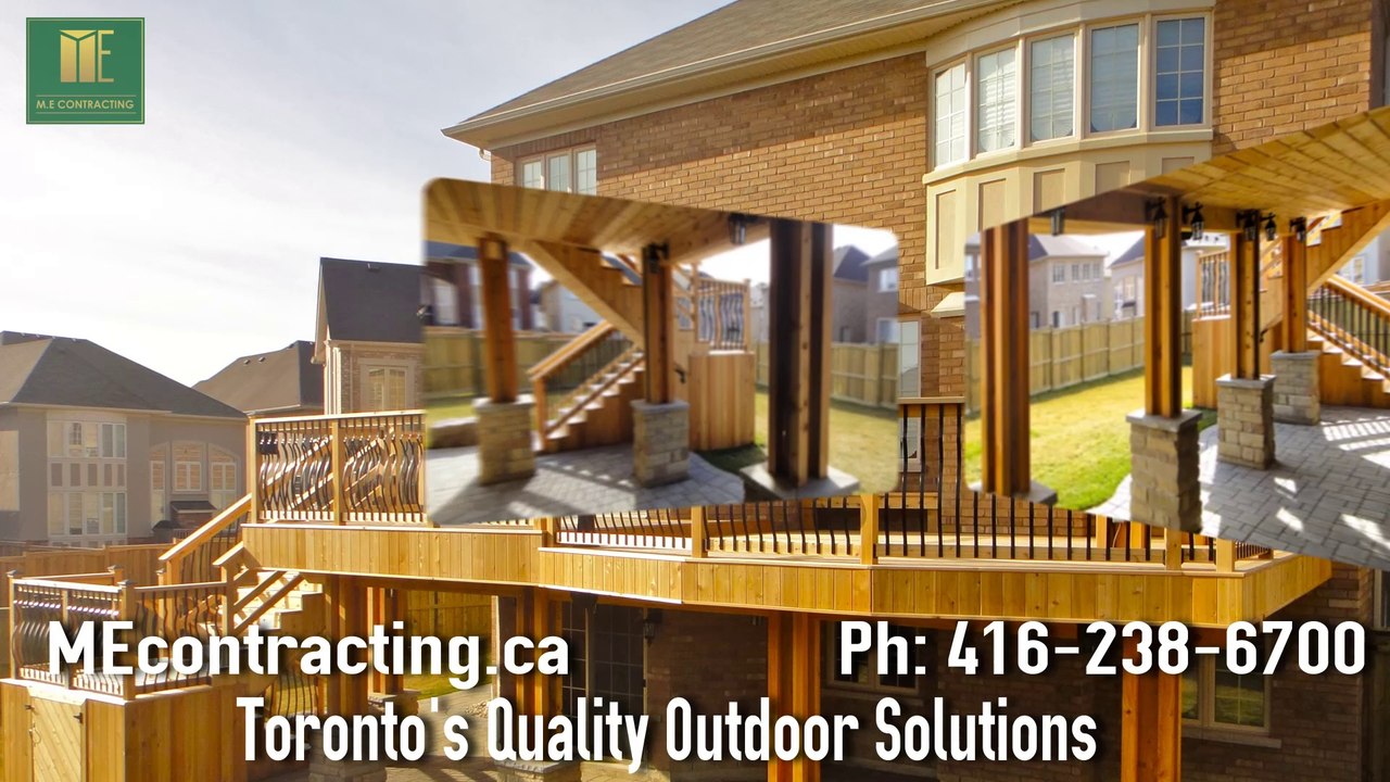 2 level cedar deck with wrought iron railings, pergola and stone walkout basement