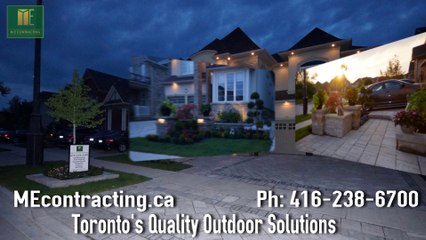 Full landscaping project with patio deck, interlocking driveway and more