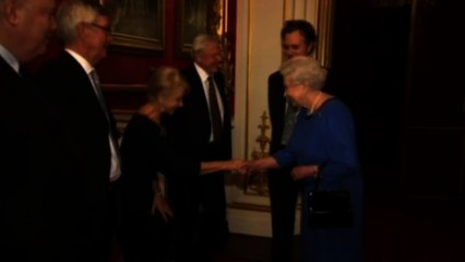 Queen welcomes acting royalty at Buckingham Palace