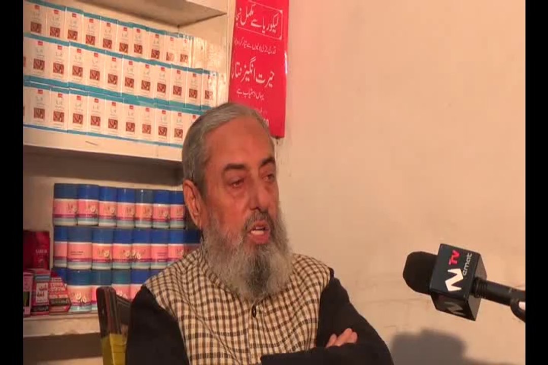 H KHAN