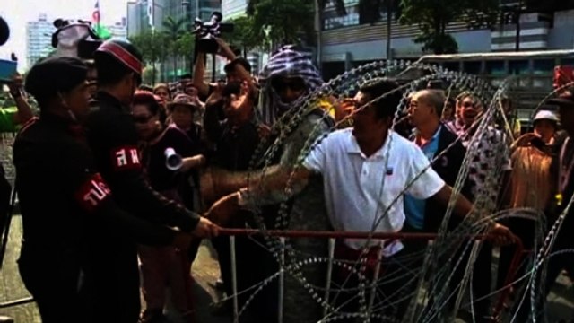 Thai protesters continue to rally, a day after deadly clashes