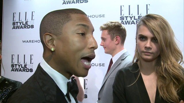 Cara Delevingne video bombs Pharrell at Elle Style Awards