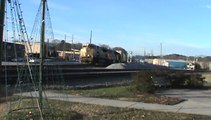 UP power leads NS 226 intermodal train EB through Austell Ga