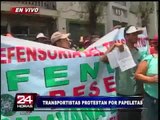 Gremios transportistas marchan exigiendo que les anulen fotopapeletas