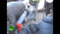 Ukraine riot video_ Berserk mob ruthlessly beat Kiev policeman on ground