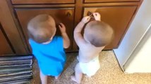 babies playing with rubber bands